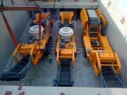 Crushing machine equipment loaded in the hold of a break bulk vessel Port Klang Malaysia for shipping to Fremantle Western Australia